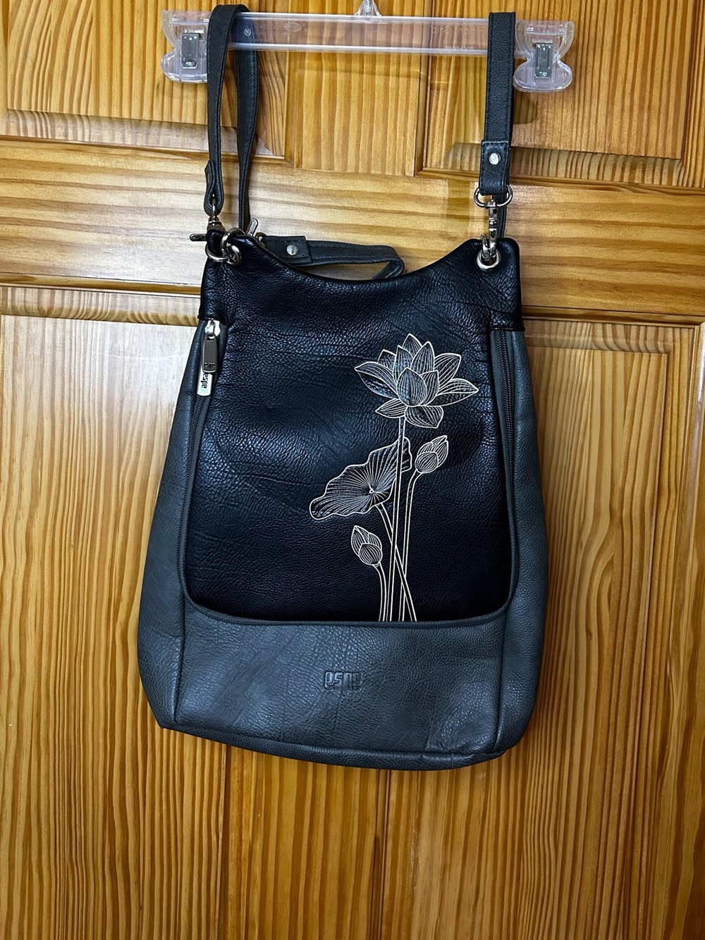 Elegant Lotus-Embroidered Black Purse with Cream Floral Etching